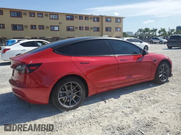 ✅ 2023 Tesla Model 3 • VIN: 5YJ3E1EA8PF571897 • Lot: 57482675. Wystawiony na Copart z przebiegiem 28 091 mil. Bezpłatny archiwum sprzedaży aukcyjnych z USA i szczegółowy raport historii pojazdu na DreamBid. Zdjęcie 3.