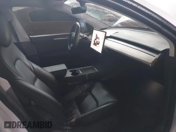 ✅ 2023 Tesla Model Y Long Range • VIN: 7SAYGDEE7PF596216 • Lot: 41557542. Listed on IAAI with 95,065 mi. Free auction sales archive from the USA and detailed vehicle history report at DreamBid. Image 5.