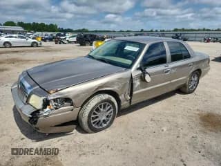 ✅ 2006 Mercury Grand Marquis GS • VIN: 2MEFM74V06X632339 • Лот: 64405325. Опубликован ранее на Copart с пробегом Не указан. Бесплатный доступ к архиву аукционных продаж из США и подробный отчёт об истории автомобиля на DreamBid. Изображение 1.