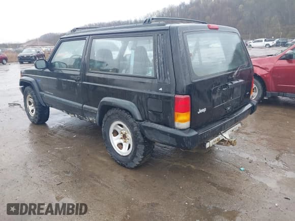 ✅ 1997 Jeep Cherokee Sport • VIN: 1J4FJ67S3VL536152 • Lot: 42013930. Listed on IAAI with 142,226 mi. Free auction sales archive from the USA and detailed vehicle history report at DreamBid. Image 3.