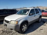 ✅ 2001 Ford Escape XLT • VIN: 1FMYU04171KB22933 • Лот: 69323215. Опубликован ранее на Copart с пробегом 251 712 миль. Бесплатный доступ к архиву аукционных продаж из США и подробный отчёт об истории автомобиля на DreamBid. Изображение 1.