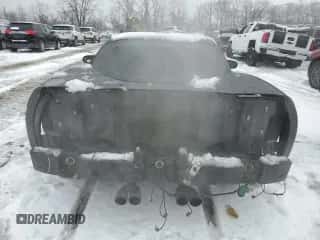 2006 Chevrolet Corvette with VIN 1G1YY26U565113187, listed as a Copart auction lot 84220834 with 153,208 mi miles and Salvage title. Bid and sale history available at DreamBid. Image 6.