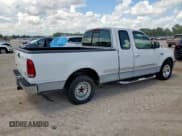 ✅ 1997 Ford F-150 XL • VIN: 1FTEX17L4VNB66944 • Lot: 62298315. Wystawiony na Copart z przebiegiem 172 314 mil. Bezpłatny archiwum sprzedaży aukcyjnych z USA i szczegółowy raport historii pojazdu na DreamBid. Zdjęcie 3.