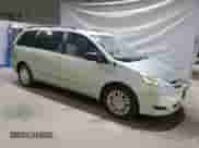 2009 Toyota Sienna LE with VIN 5TDBK23CX9S027351, listed as a Copart auction lot 68439665 with 151,844 mi miles and Clean title. Bid and sale history available at DreamBid. Image 4.