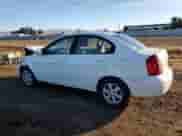 2011 Hyundai Accent GLS z VIN KMHCN4AC5BU607596, wystawiony jako Copart lot #79515184 z przebiegiem 137 475 mil mil oraz Szkoda całkowita • Salvage title. Historia ofert i sprzedaży dostępna na DreamBid. Obrazek 2.