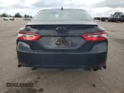 ✅ 2021 Toyota Camry SE Nightshade • VIN: 4T1G11AKXMU441145 • Лот: 87196705. Опубликован ранее на Copart с пробегом 82 628 миль. Бесплатный доступ к архиву аукционных продаж из США и подробный отчёт об истории автомобиля на DreamBid. Изображение 6.