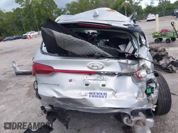 2022 Hyundai Santa Fe SEL z VIN 5NMS2DAJ8NH374641, wystawiony jako IAAI lot #42914061 z przebiegiem Nie podano mil oraz . Historia ofert i sprzedaży dostępna na DreamBid. Obrazek 17.