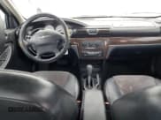 ✅ 2005 Chrysler Sebring • VIN: 1C3EL66R95N562516 • Lot: 45698335. Listed on Copart with 120,929 mi. Free auction sales archive from the USA and detailed vehicle history report at DreamBid. Image 8.