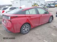 ✅ 2021 Toyota Prius LE • VIN: JTDL9MFU2M3026544 • Lot: 41336274. Listed on IAAI with 76,055 mi. Free auction sales archive from the USA and detailed vehicle history report at DreamBid. Image 4.