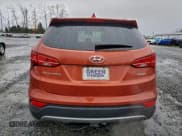 ✅ 2014 Hyundai Santa Fe • VIN: 5XYZU3LB6EG224224 • Лот: 94469115. Опубликован ранее на Copart с пробегом 143 111 миль. Бесплатный доступ к архиву аукционных продаж из США и подробный отчёт об истории автомобиля на DreamBid. Изображение 6.