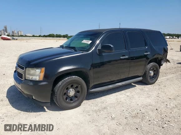 ✅ 2014 Chevrolet Tahoe Commercial • VIN: 1GNLC2E0XER225352 • Lot: 67223065. Listed on Copart with 141,608 mi. Free auction sales archive from the USA and detailed vehicle history report at DreamBid. Image 1.