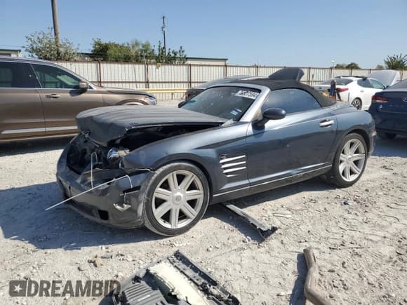 ✅ 2006 Chrysler Crossfire Limited • VIN: 1C3AN65L86X066358 • Lot: 76327594. Listed on Copart with 147,725 mi. Free auction sales archive from the USA and detailed vehicle history report at DreamBid. Image 1.