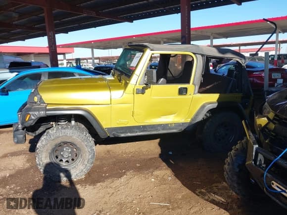 ✅ 2000 Jeep Wrangler Sport • VIN: 1J4FA49S8YP769006 • Lot: 43480409. Wystawiony na IAAI z przebiegiem Nie podano. Bezpłatny archiwum sprzedaży aukcyjnych z USA i szczegółowy raport historii pojazdu na DreamBid. Zdjęcie 14.