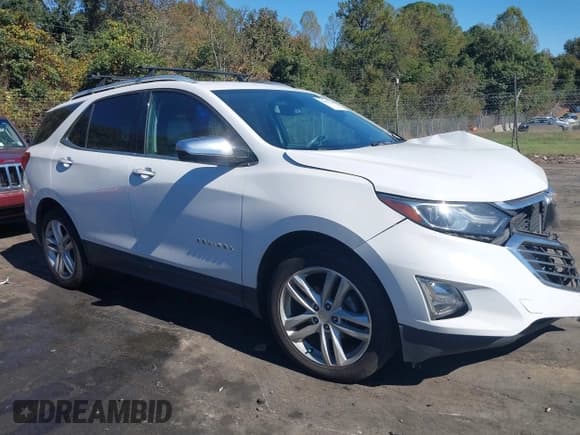 ✅ 2018 Chevrolet Equinox Premier • VIN: 2GNAXVEV0J6125484 • Лот: 43473330. Опубликован ранее на IAAI с пробегом 125 692 миль. Бесплатный доступ к архиву аукционных продаж из США и подробный отчёт об истории автомобиля на DreamBid. Изображение 13.