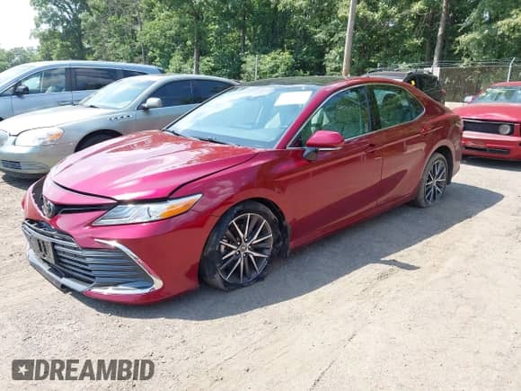 2022 Toyota Camry XLE z VIN 4T1F11AK9NU068628, wystawiony jako IAAI lot #42562631 z przebiegiem 54 264 mil mil oraz . Historia ofert i sprzedaży dostępna na DreamBid. Obrazek 2.
