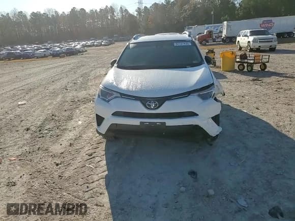 ✅ 2018 Toyota RAV4 LE • VIN: JTMBFREV5JJ727484 • Lot: 92727435. Listed on Copart with 106,604 mi. Free auction sales archive from the USA and detailed vehicle history report at DreamBid. Image 14.