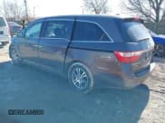 ✅ 2012 Honda Odyssey EX-L • VIN: 5FNRL5H61CB095761 • Lot: 41647368. Listed on IAAI with 146,661 mi. Free auction sales archive from the USA and detailed vehicle history report at DreamBid. Image 3.