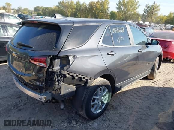 2022 Chevrolet Equinox LT with VIN 2GNAXUEV5N6145505, listed as a IAAI auction lot 43368228 with 73,302 mi miles and . Bid and sale history available at DreamBid. Image 4.