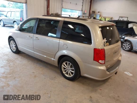 ✅ 2014 Dodge Grand Caravan SXT • VIN: 2C4RDGCG2ER105598 • Lot: 42648383. Listed on IAAI with 103,238 mi. Free auction sales archive from the USA and detailed vehicle history report at DreamBid. Image 3.