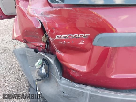 ✅ 2006 Ford Escape XLS • VIN: 1FMYU02ZX6KC27594 • Lot: 41162362. Listed on IAAI with 73,444 mi. Free auction sales archive from the USA and detailed vehicle history report at DreamBid. Image 6.