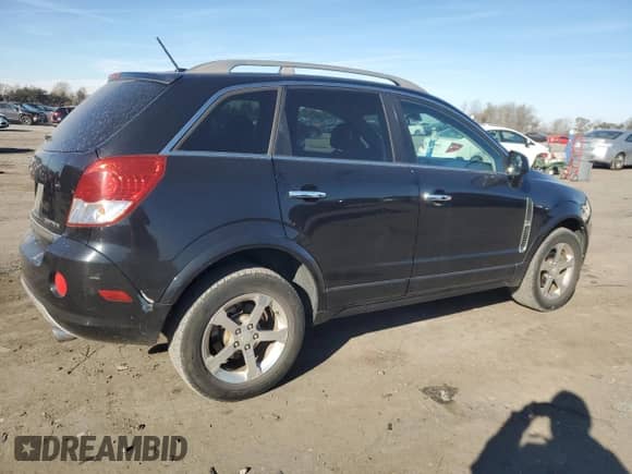 2012 Chevrolet Captiva Sport LT z VIN 3GNAL3E5XCS613703, wystawiony jako Copart lot #83405654 z przebiegiem 128 792 mil mil oraz Szkoda całkowita • Salvage title. Historia ofert i sprzedaży dostępna na DreamBid. Obrazek 3.