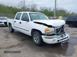 2006 GMC Sierra 1500 SL with VIN 2GTEC13VX61312995, listed as a IAAI auction lot 41888679 with 164,640 mi miles and . Bid and sale history available at DreamBid. Image 1.
