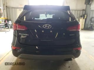 ✅ 2018 Hyundai Santa Fe 2.4L • VIN: 5XYZT3LB4JG556854 • Лот: 44599883. Опубликован ранее на Copart с пробегом 83 869 миль. Бесплатный доступ к архиву аукционных продаж из США и подробный отчёт об истории автомобиля на DreamBid. Изображение 6.