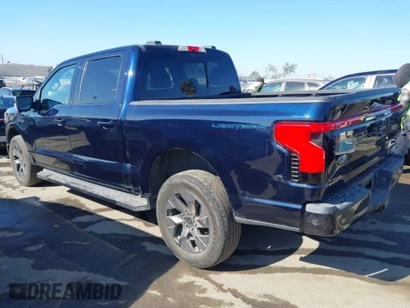 ✅ 2023 Ford F-150 Lightning Pro • VIN: 1FT6W1EV3PWG05365 • Лот: 43109323. Опубликован ранее на IAAI с пробегом 53 502 миль. Бесплатный доступ к архиву аукционных продаж из США и подробный отчёт об истории автомобиля на DreamBid. Изображение 3.