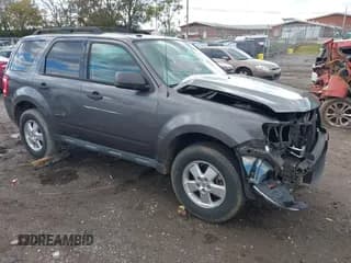 ✅ 2012 Ford Escape XLT • VIN: 1FMCU0D70CKC36581 • Lot: 43563302. Listed on IAAI with 120,064 mi. Free auction sales archive from the USA and detailed vehicle history report at DreamBid. Image 1.