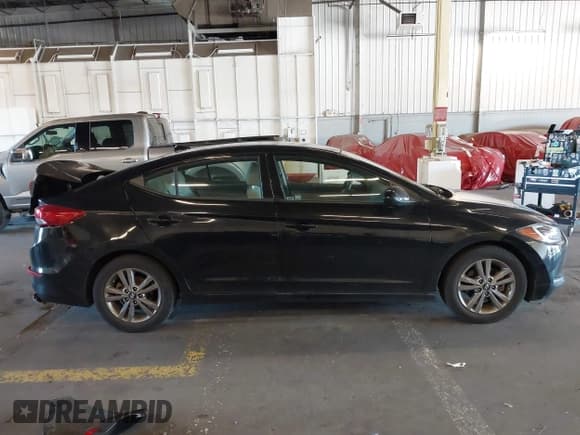 ✅ 2018 Hyundai Elantra Value Edition • VIN: 5NPD84LF0JH215514 • Lot: 43400585. Listed on IAAI with 101,238 mi. Free auction sales archive from the USA and detailed vehicle history report at DreamBid. Image 13.