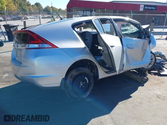 ✅ 2012 Honda Insight EX • VIN: JHMZE2H70CS000156 • Lot: 43483870. Listed on IAAI with Not provided. Free auction sales archive from the USA and detailed vehicle history report at DreamBid. Image 4.