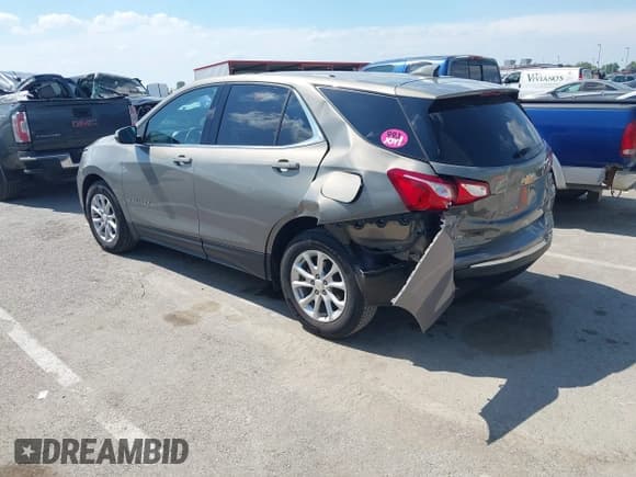 ✅ 2018 Chevrolet Equinox LT • VIN: 3GNAXJEV1JS564204 • Lot: 42823651. Listed on IAAI with 56,842 mi. Free auction sales archive from the USA and detailed vehicle history report at DreamBid. Image 3.