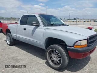 ✅ 2002 Dodge Dakota Sport • VIN: 1B7GL32X82S632091 • Lot: 42091290. Wystawiony na IAAI z przebiegiem 206 721 mil. Bezpłatny archiwum sprzedaży aukcyjnych z USA i szczegółowy raport historii pojazdu na DreamBid. Zdjęcie 1.