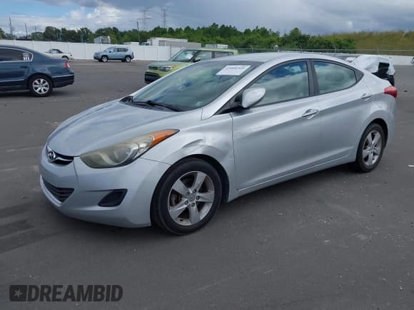 ✅ 2013 Hyundai Elantra GLS • VIN: 5NPDH4AE6DH373385 • Lot: 43404309. Listed on IAAI with 125,089 mi. Free auction sales archive from the USA and detailed vehicle history report at DreamBid. Image 2.