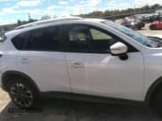 ✅ 2016 Mazda CX-5 Grand Touring • VIN: JM3KE2DY0G0695894 • Lot: 43441374. Wystawiony na IAAI z przebiegiem 112 838 mil. Bezpłatny archiwum sprzedaży aukcyjnych z USA i szczegółowy raport historii pojazdu na DreamBid. Zdjęcie 12.