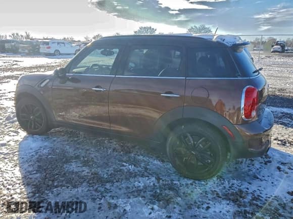 ✅ 2014 MINI Countryman S • VIN: WMWZC5C59EWP39467 • Lot: 94575355. Listed on Copart with 127,263 mi. Free auction sales archive from the USA and detailed vehicle history report at DreamBid. Image 2.
