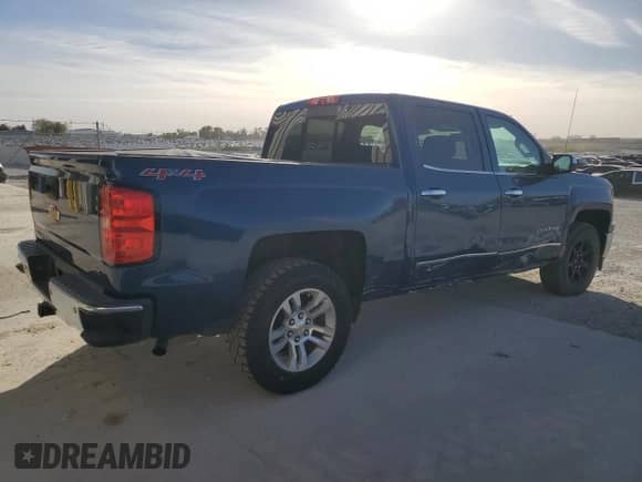 2015 Chevrolet Silverado 1500 LTZ with VIN 3GCUKSEC9FG525833, listed as a Copart auction lot 87082825 with 129,711 mi miles and Salvage title. Bid and sale history available at DreamBid. Image 3.