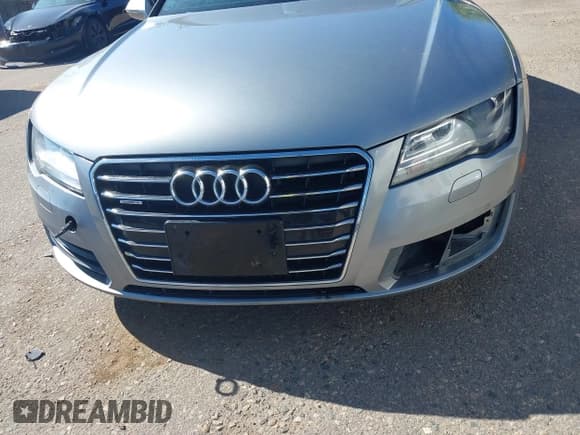 ✅ 2014 Audi A7 Premium Plus • VIN: WAUWGAFC9EN074652 • Lot: 43231485. Wystawiony na IAAI z przebiegiem 175 298 mil. Bezpłatny archiwum sprzedaży aukcyjnych z USA i szczegółowy raport historii pojazdu na DreamBid. Zdjęcie 6.
