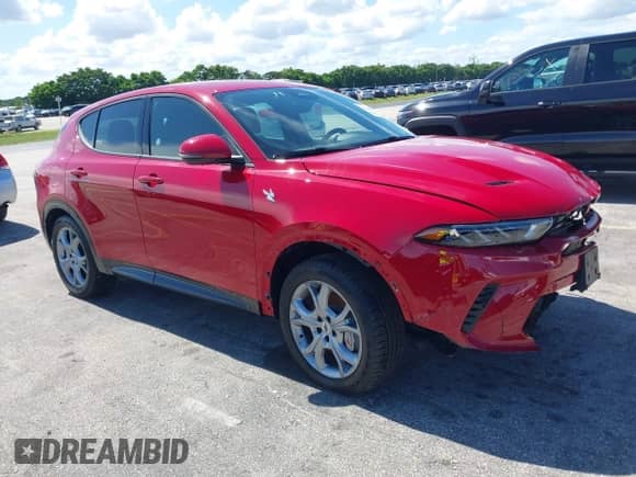 2024 Dodge Hornet R/T z VIN ZACPDFCW7R3A44078, wystawiony jako IAAI lot #42603078 z przebiegiem 7 540 mil mil oraz . Historia ofert i sprzedaży dostępna na DreamBid. Obrazek 1.