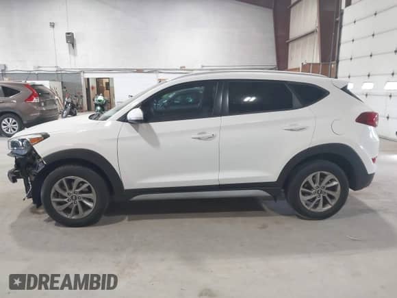 2017 Hyundai Tucson SE z VIN KM8J33A48HU404856, wystawiony jako IAAI lot #43225561 z przebiegiem 53 542 mil mil oraz . Historia ofert i sprzedaży dostępna na DreamBid. Obrazek 14.