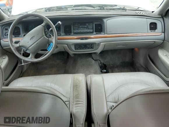 ✅ 1997 Ford Crown Victoria LX • VIN: 2FALP74WXVX114442 • Lot: 59524075. Listed on Copart with 138,450 mi. Free auction sales archive from the USA and detailed vehicle history report at DreamBid. Image 8.