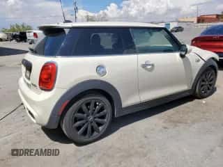 2015 MINI Hardtop S with VIN WMWXP7C56F2A58203, listed as a Copart auction lot 62602855 with 101,679 mi miles and Salvage title. Bid and sale history available at DreamBid. Image 3.
