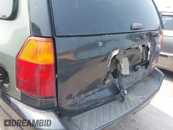 ✅ 2004 GMC Envoy SLT • VIN: 1GKET16S946225035 • Lot: 42416602. Listed on IAAI with Not provided. Free auction sales archive from the USA and detailed vehicle history report at DreamBid. Image 6.