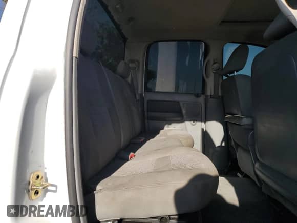 2006 Dodge 1500 Laramie z VIN 1D7HU18216S554363, wystawiony jako Copart lot #68652935 z przebiegiem 197 063 mil mil oraz Nie do naprawy • Non repairable. Historia ofert i sprzedaży dostępna na DreamBid. Obrazek 10.