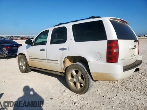 ✅ 2014 Chevrolet Tahoe LTZ • VIN: 1GNSCCE00ER106095 • Lot: 81633235. Listed on Copart with 311,501 mi. Free auction sales archive from the USA and detailed vehicle history report at DreamBid. Image 2.