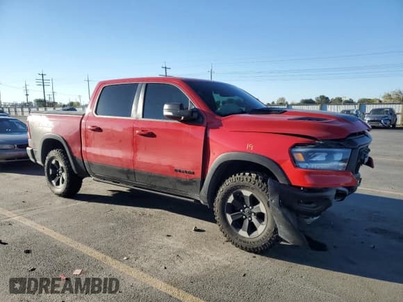 ✅ 2020 Ram 1500 Rebel • VIN: 1C6SRFLTXLN311313 • Lot: 82324345. Listed on Copart with 79,509 mi. Free auction sales archive from the USA and detailed vehicle history report at DreamBid. Image 4.