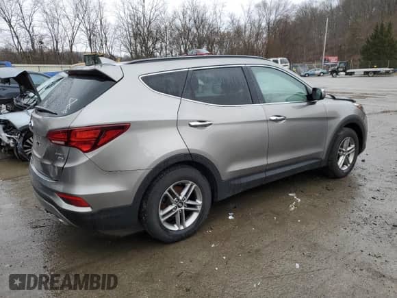 ✅ 2018 Hyundai Santa Fe 2.4L • VIN: 5XYZUDLBXJG570714 • Lot: 44275493. Wystawiony na Copart z przebiegiem 77 032 mil mil. Skorzystaj z bezpłatnego archiwum sprzedaży aukcyjnych z USA i zobacz szczegółowy raport historii pojazdu na DreamBid. Zdjęcie 3.