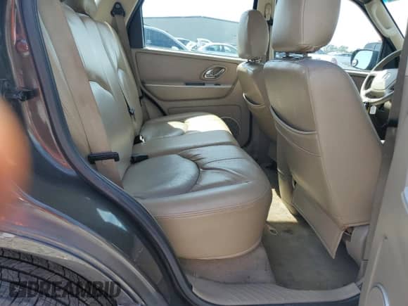 2006 Mercury Mariner Convenience z VIN 4M2YU56Z86DJ00448, wystawiony jako Copart lot #65950725 z przebiegiem 167 854 mil mil oraz Szkoda całkowita • Salvage title. Historia ofert i sprzedaży dostępna na DreamBid. Obrazek 10.