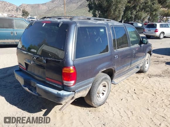 ✅ 1999 Mercury Mountaineer • VIN: 4M2ZU55P1XUJ08154 • Lot: 43857794. Listed on IAAI with 245,120 mi. Free auction sales archive from the USA and detailed vehicle history report at DreamBid. Image 4.