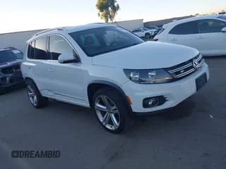 ✅ 2016 Volkswagen Tiguan S • VIN: WVGAV7AX3GW082710 • Lot: 43352705. Listed on IAAI with 83,260 mi. Free auction sales archive from the USA and detailed vehicle history report at DreamBid. Image 1.